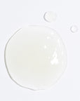 Glob of serum on white background