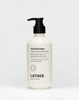 off-white pump bottle of moisturizer