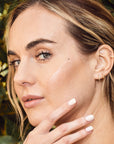 Woman with hyaluronic acid applied to her cheek bone.