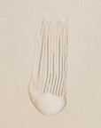 swatch of skincare product on white background.