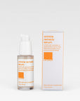 A clear plastic bottle with a white pump dispenser containing the Wrinkle Remedy Serum with its box packaging to the right of it.