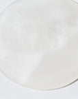 Close up of Bamboo Creme Body Wash product to show pearlescent viscous texture