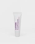 A tube of LATHER Lip Conditioning Balm against a white background.