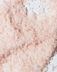 Zoomed in image of Muscle Ease Bath Salts, emphasizing texture