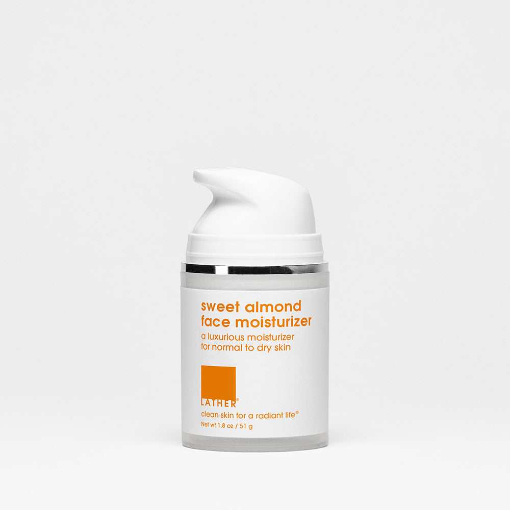 White botttle with pump on white background.